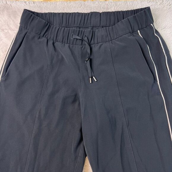 Lululemon On The Right Track Womens Pants Black Loose Fit Slit Hem Size 10 - Picture 3 of 11
